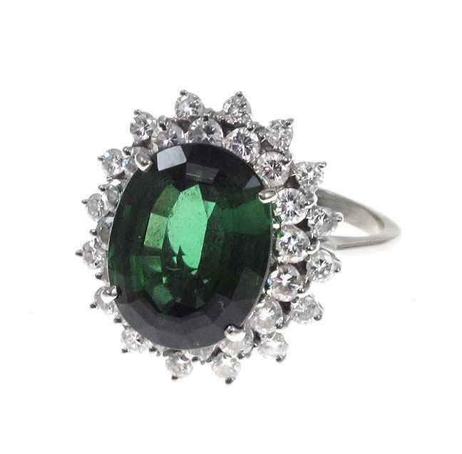 Appraisal: CT TOURMALINE RING WITH DIAMONDS K white gold ring centers