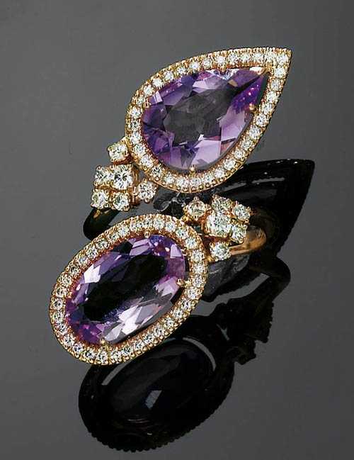 Appraisal: AMETHYST AND BRILLIANT-CUT DIAMOND RING Red gold Large crois model