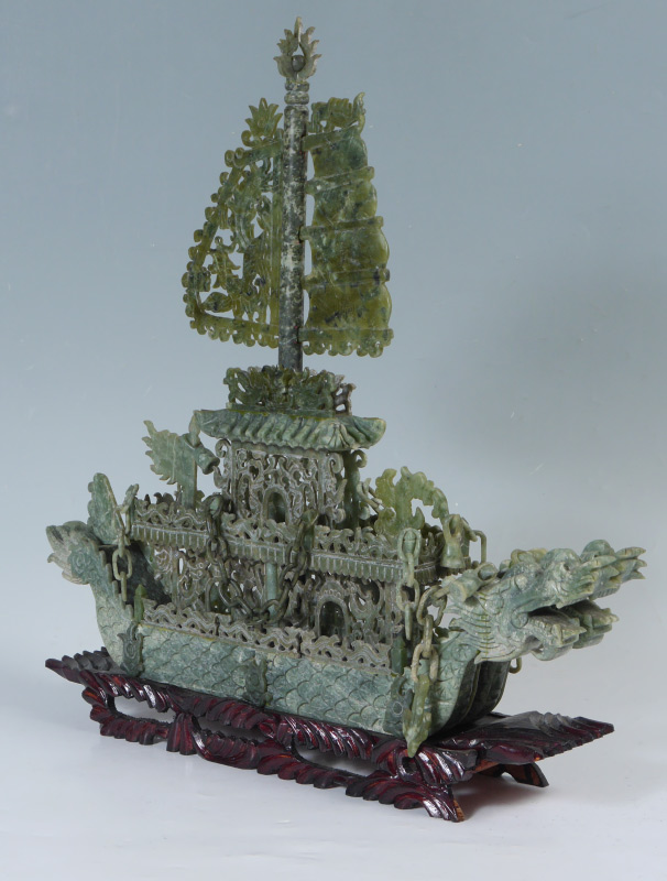 Appraisal: CARVED CHINESE SERPENTINE DOUBLE DRAGON BOAT Boat with figural double