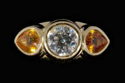 Appraisal: Diamond golden sapphire ring central Old European-cut diamond estimated weight