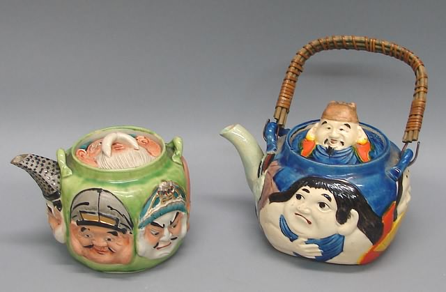 Appraisal: Banko teapot with faces of Gods of good fortune x