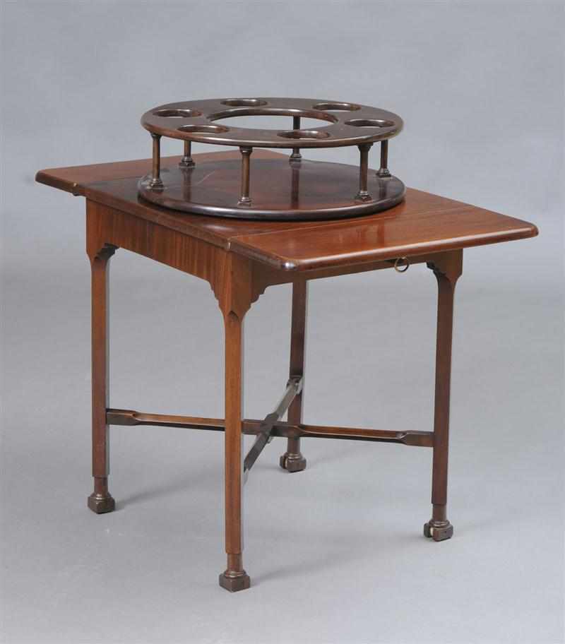 Appraisal: GEORGE III MAHOGANY BOTTLE TABLE With a mechanical superstructure above