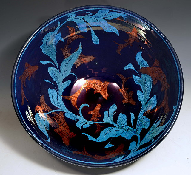 Appraisal: Jonathan Chiswell Jones British b 'Fish and seaweed' bowl in