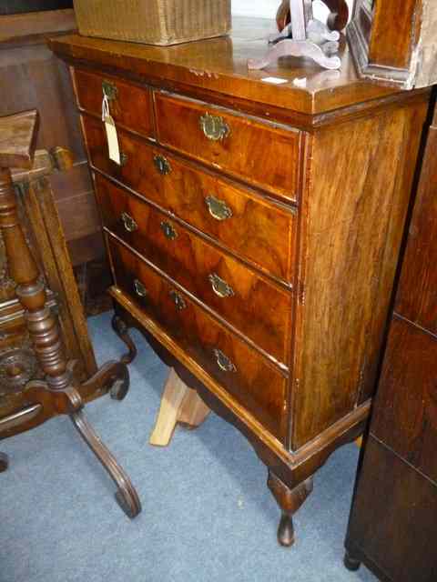 Appraisal: AN TH CENTURY AND LATER WALNUT CHEST ON STAND of