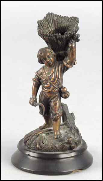 Appraisal: PATINATED BRONZE FIGURE OF A BOY HARVESTING Unsigned Overall height