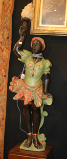 Appraisal: A VENETIAN STYLE BLACKAMOOR LAMP Modelled as a standing male