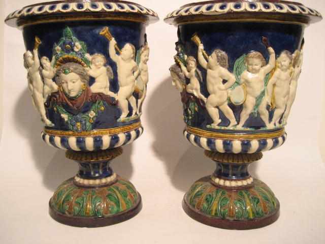 Appraisal: A pair of Majolica style earthenware urns height in diameter