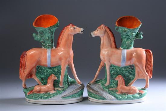 Appraisal: PAIR STAFFORDSHIRE FIGURAL SPILL VASES Circa Modelled as horses and