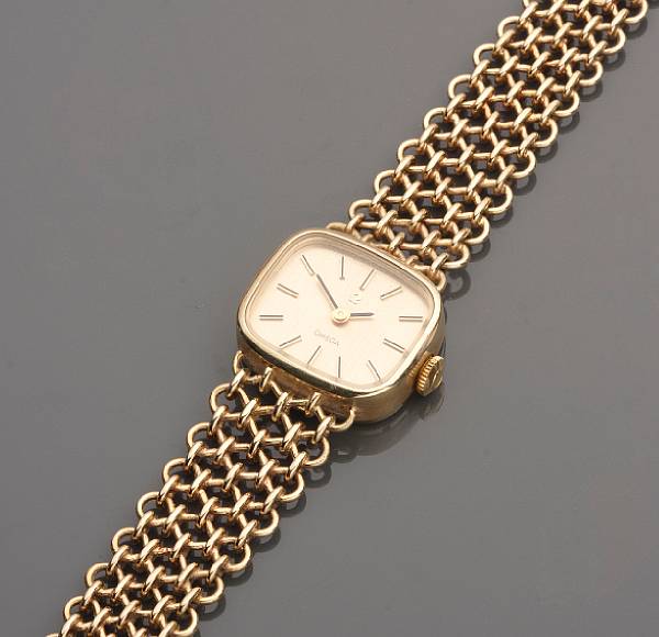 Appraisal: A k gold bracelet wristwatch Omega jewel movement with link