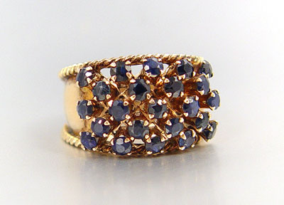 Appraisal: K SAPPHIRE STUDDED WIDE BAND RING K yellow gold ring