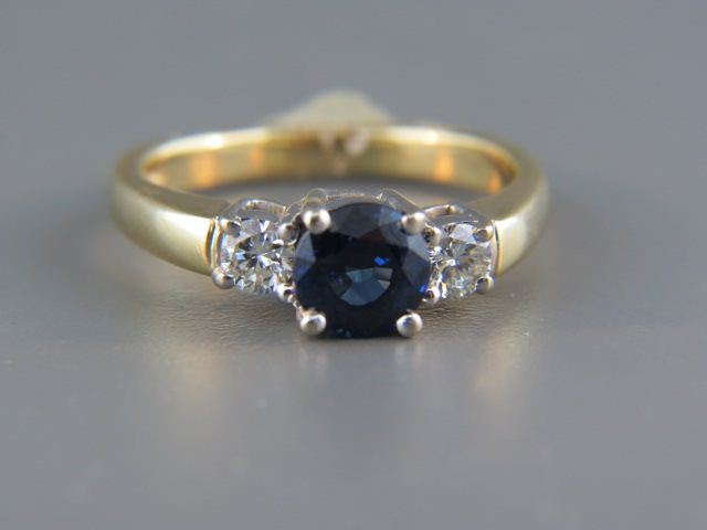 Appraisal: Sapphire Diamond Ring rich blue gem weighing carat with diamond