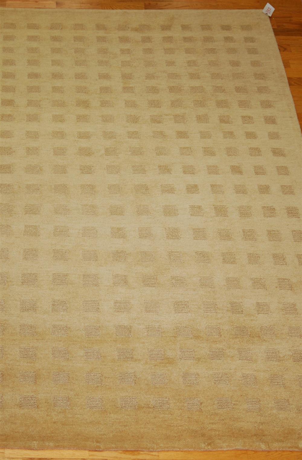 Appraisal: CONTEMPORARY WOOL RUG having a textured pile of golden beige