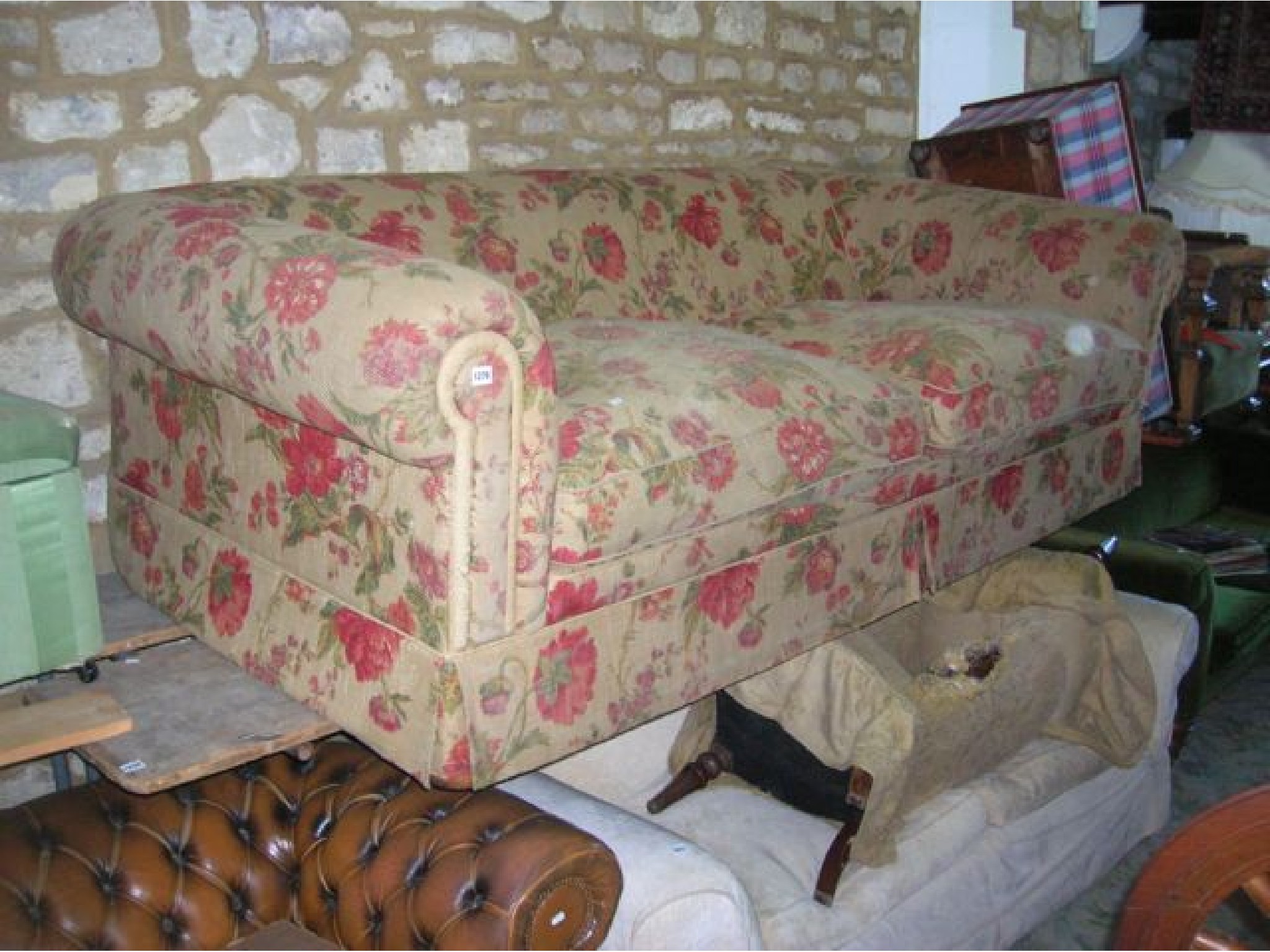 Appraisal: A substantial contemporary two to three seat Chesterfield type sofa