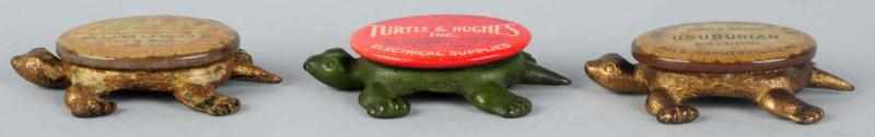 Appraisal: Lot of Cast Iron Advertising Turtle Paperweights Cast iron with