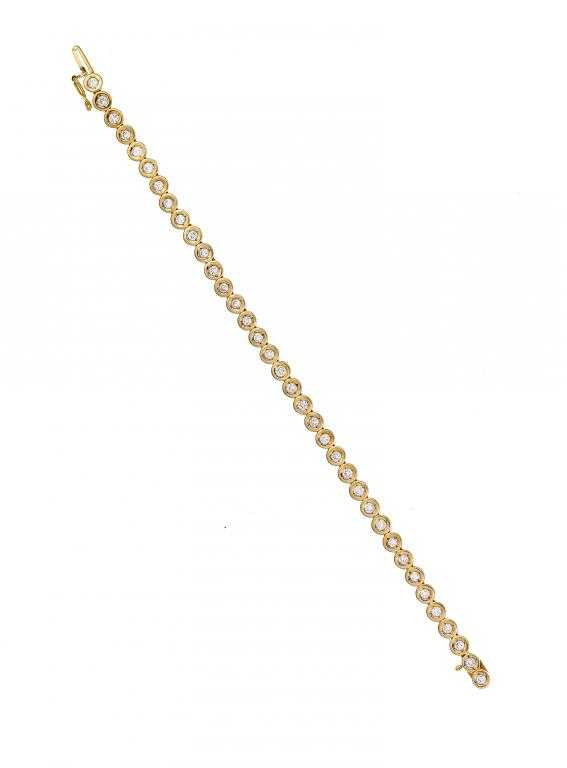 Appraisal: A DIAMOND LINE BRACELET in ct gold import marked London