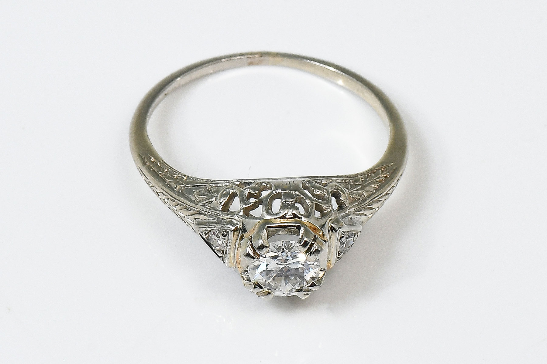 Appraisal: ART DECO K DIAMOND RING CT round brilliant cut center