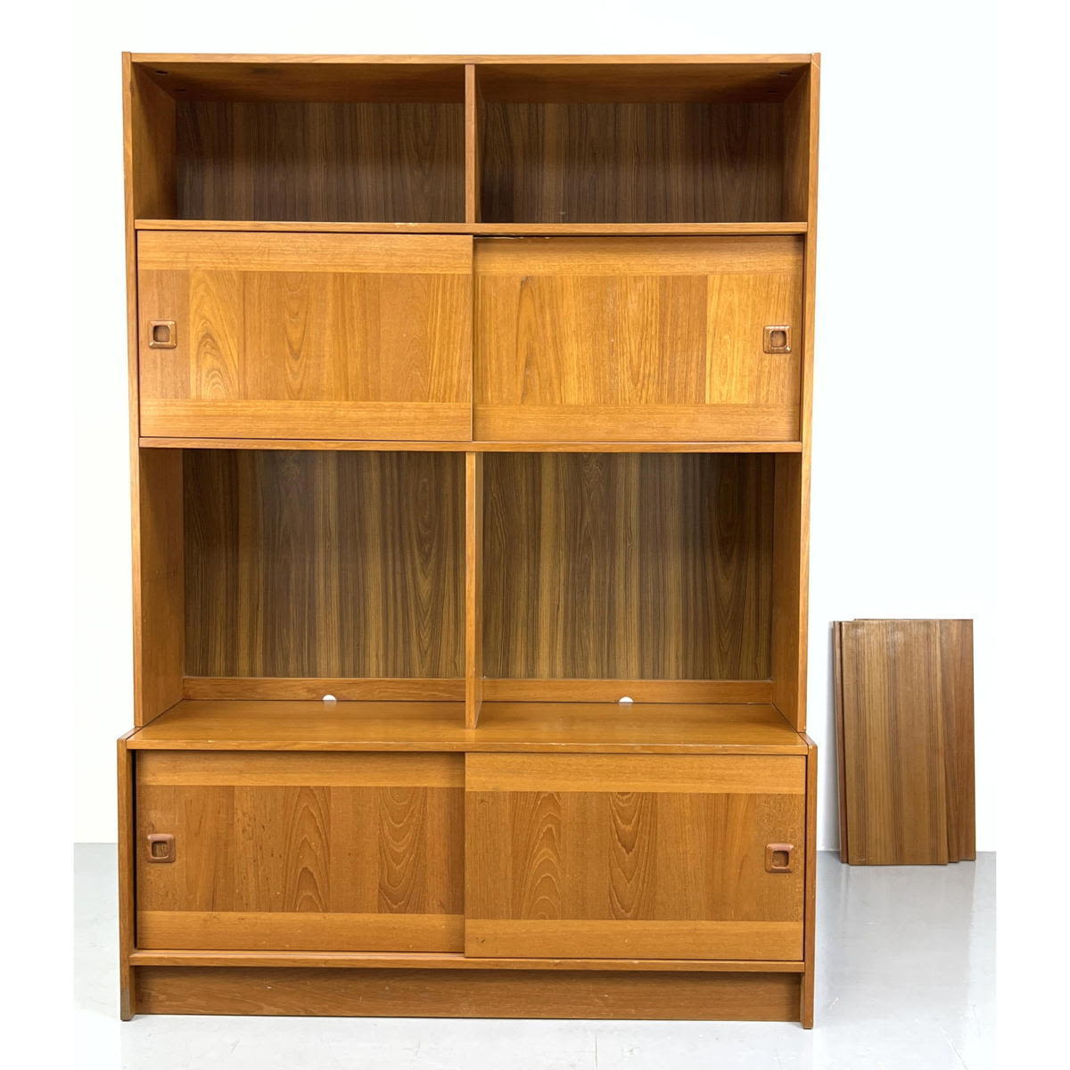 Appraisal: DOMINO MOBLER Danish Teak Part Cabinet Bookcase Two pair sliding