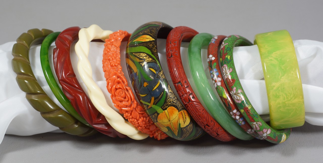 Appraisal: bangle bracelets cloisonn cinnabar pseudo-coral carved Bakelite plastic lacquer green