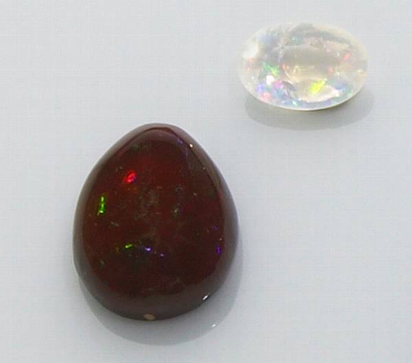 Appraisal: Chocolate Opal and a Contra Luz Opal Ethiopia Large brown