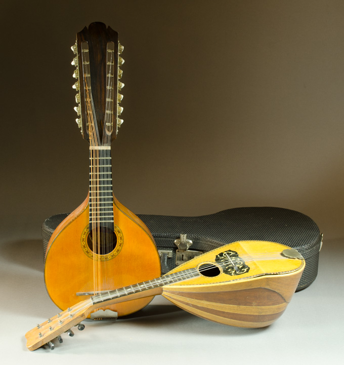 Appraisal: TWO STRINGED MUSICAL INSTRUMENTS the first an string mandolin having