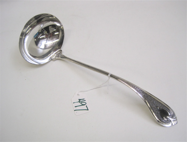 Appraisal: AMERICAN STERLING SILVER PUNCH LADLE marked by the retailer Braverman