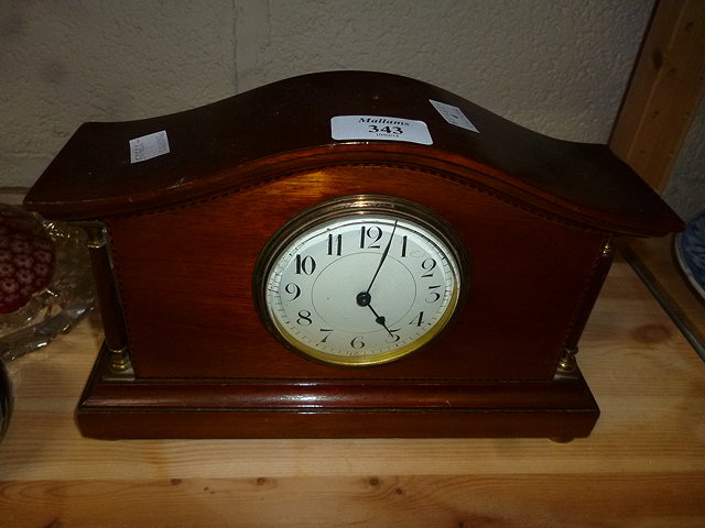 Appraisal: AN EDWARDIAN MAHOGANY CASED MANTEL CLOCK the white dial with