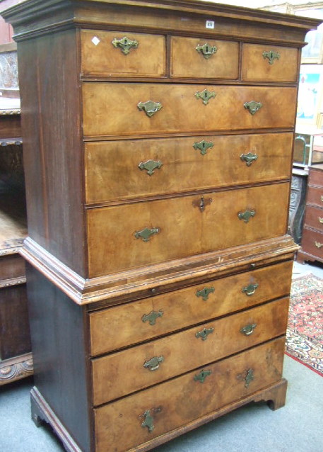 Appraisal: A mid th century walnut chest on chest the moulded