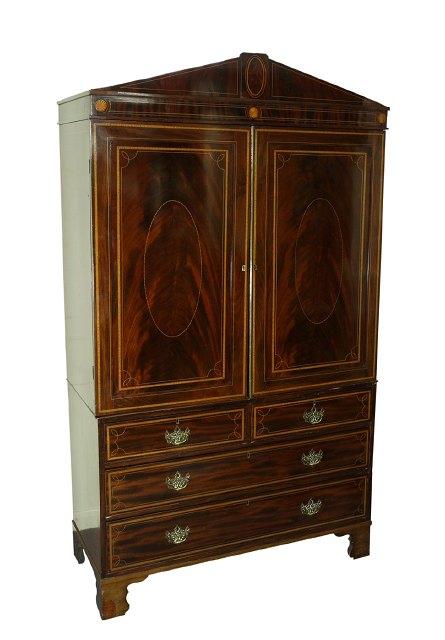 Appraisal: A late th Century mahogany linen press the whole inlaid