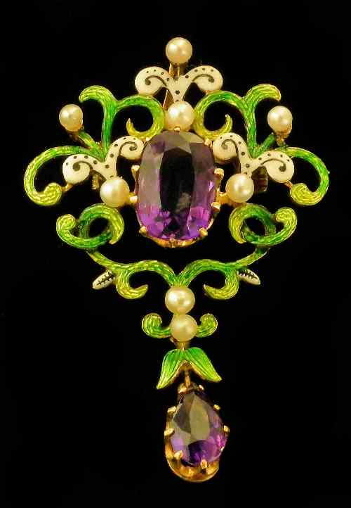 Appraisal: A late Victorian 'Suffragette' gold coloured metal mounted amethyst seed