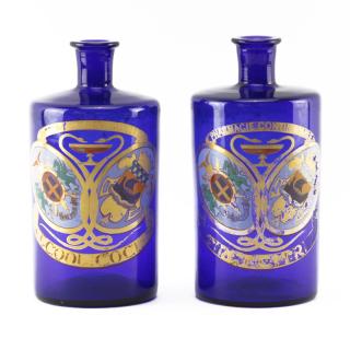 Appraisal: Pair of Cobalt Glass Gilt Painted Pharmacie Continentale Apothecary Bottles