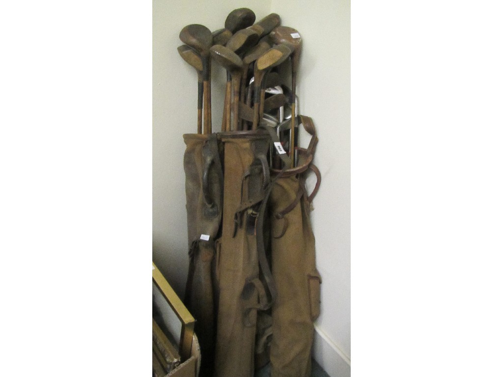 Appraisal: Four bags of assorted hickory shafted and other golf clubs