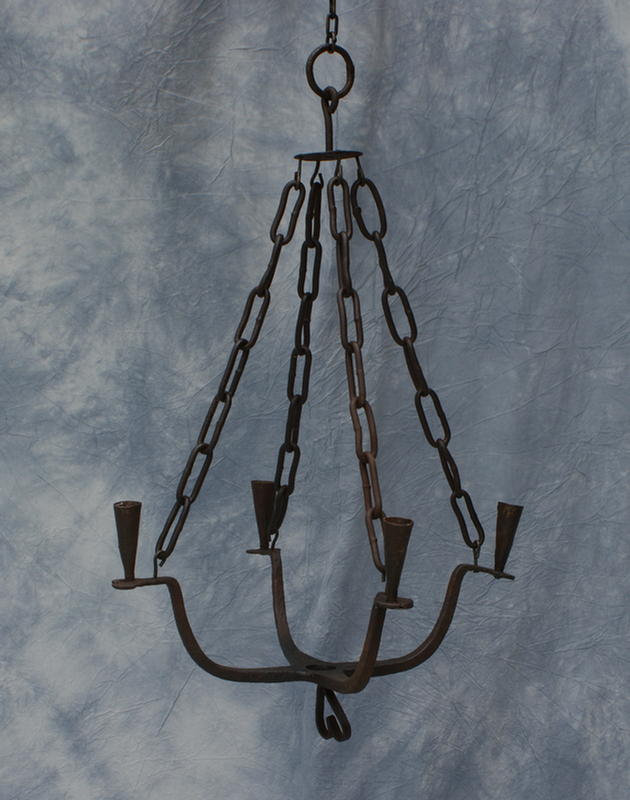 Appraisal: Hand hammered iron hanging light with four arms approx h