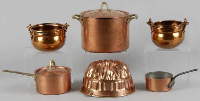 Appraisal: Lot of Copper Pieces Description Includes two lidded pots one