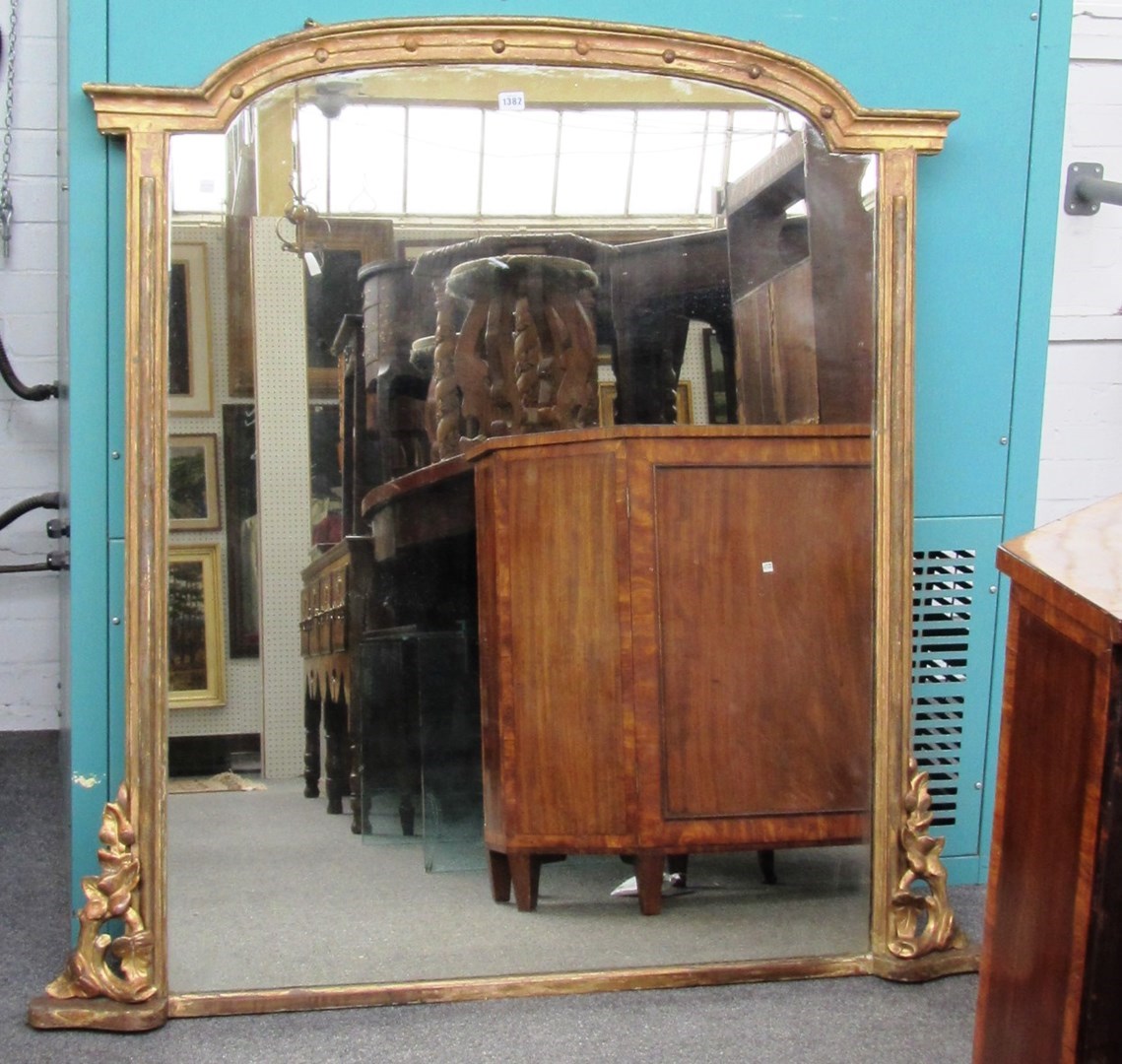 Appraisal: A Victorian gilt framed arch top overmantel mirror cm wide