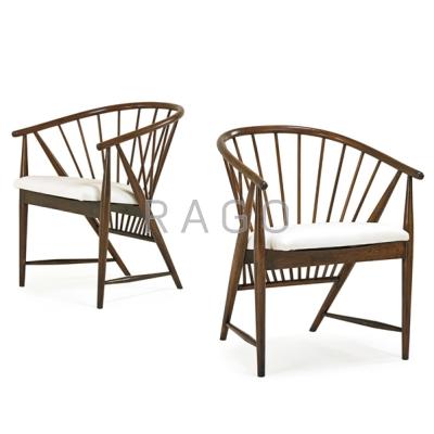 Appraisal: SONNA ROSEN Pair of sun Feather chairs Sweden s Stained