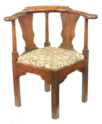 Appraisal: A late George III oak corner armchair having vase shaped