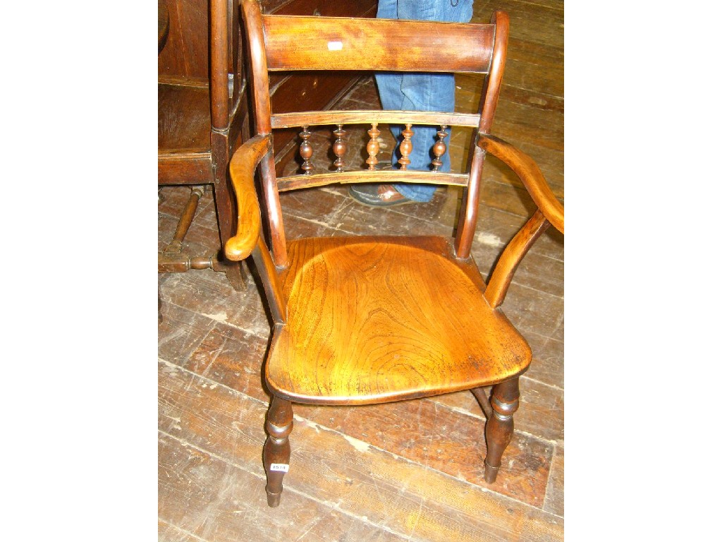 Appraisal: A th century Windsor bar back kitchen elbow chair in