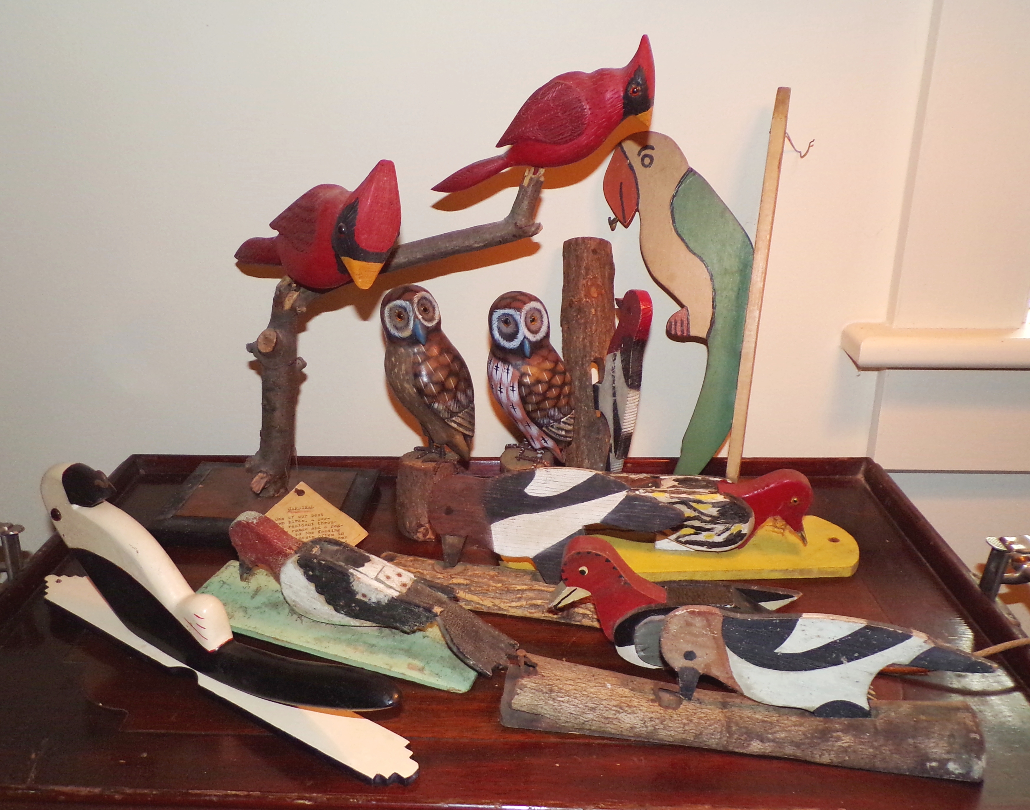 Appraisal: Folk Art carved and painted wood birds