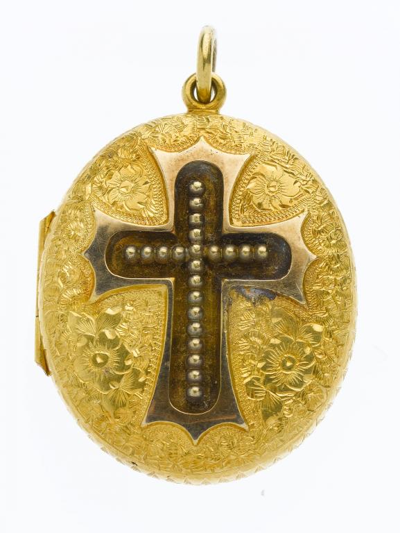 Appraisal: A VICTORIAN GOLD LOCKET the lid applied with a cross