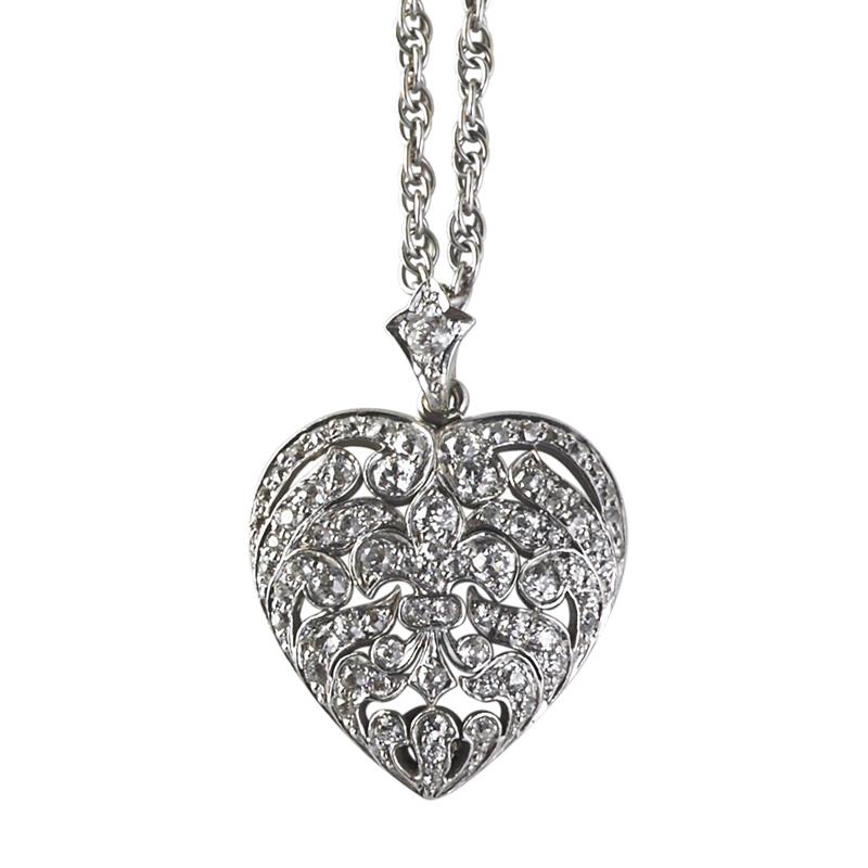 Appraisal: EDWARDIAN PLATINUM DIAMOND HEART PENDANT Open OEC diamond set central