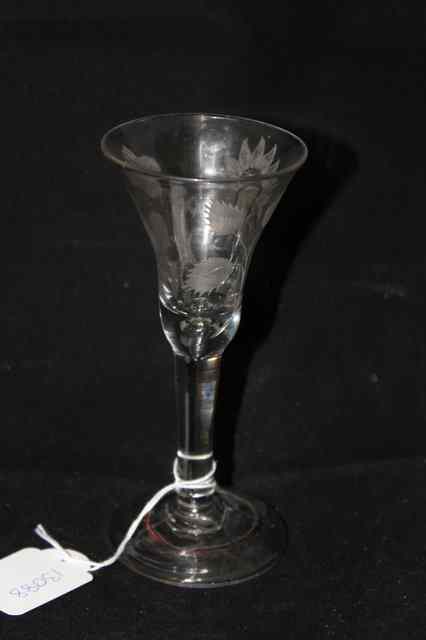 Appraisal: A POSSIBLY JACOBITE WINE GLASS with trumpet shaped bowl engraved