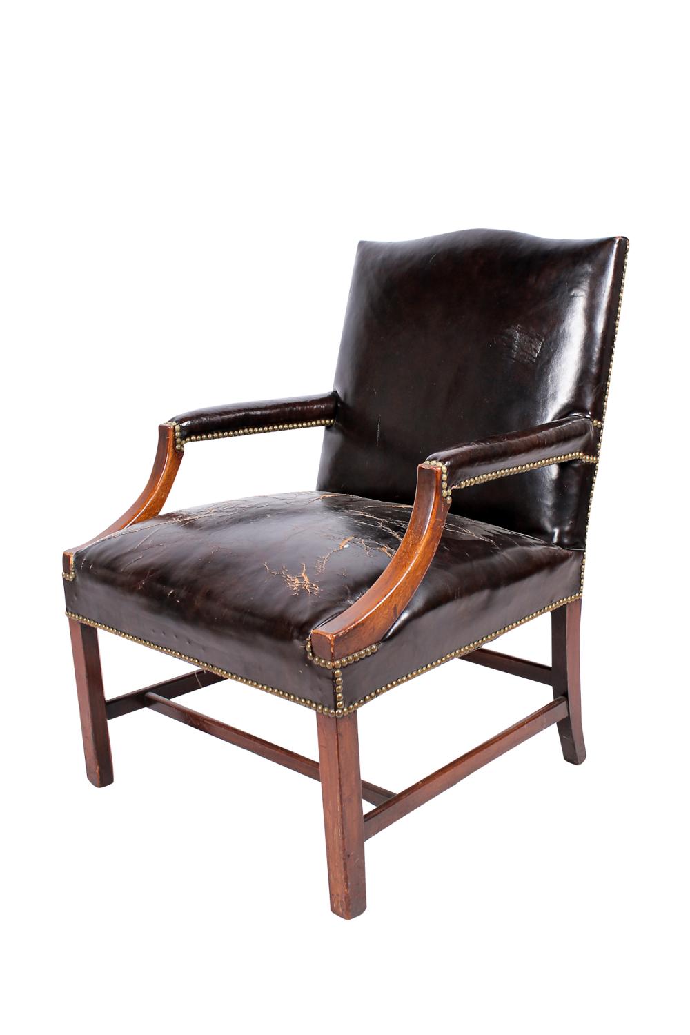 Appraisal: GEORGIAN STYLE MAHOGANY ARMCHAIR FRAME NAUGAHIDE AS ISCondition distressing to