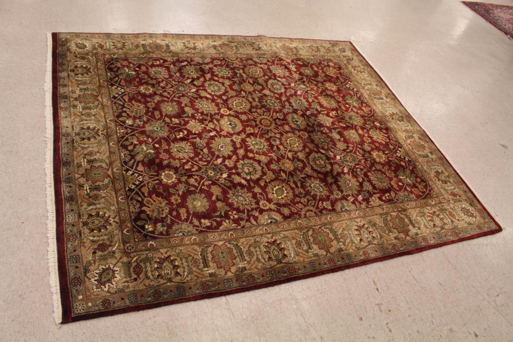 Appraisal: HAND KNOTTED ORIENTAL CARPET Indo-Persian overall floral design on red