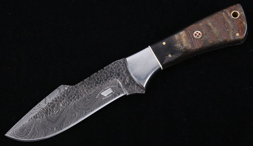 Appraisal: M T Knives Rams Horn Damascus Hammered Knife This is