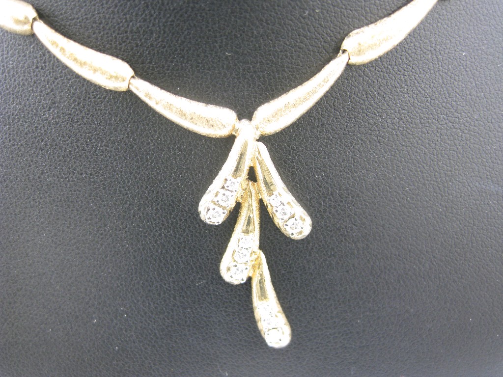 Appraisal: A Continental Diamond Necklace pav -set twelve brilliant-cut stones in