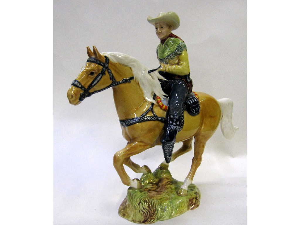 Appraisal: Beswick figure of a cowboy modelled riding a palomino horse