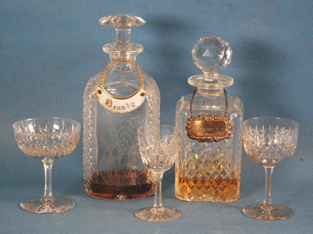 Appraisal: FIVE CUT GLASS DECANTERS including one with hallmarked silver label