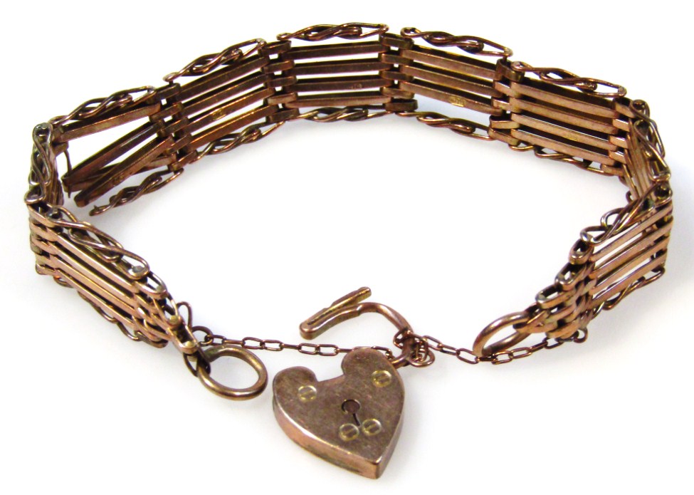 Appraisal: A ct gate bracelet with heart shaped clasp cm long