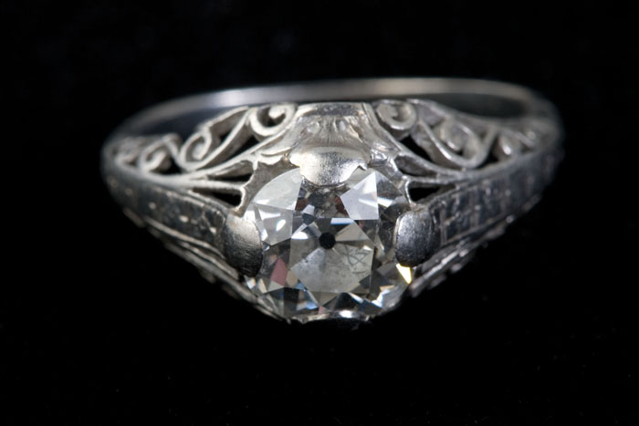 Appraisal: DIAMOND AND PLATINUM RING The ring set with one round