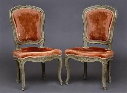 Appraisal: PAIR OF LOUIS XV-STYLE CARVED AND PAINTED CHAISES Each cartouche